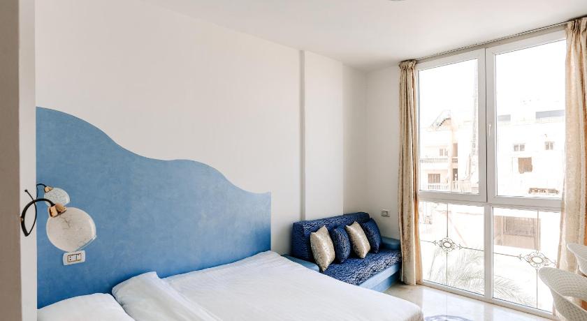 Image of Triple Room with Pyramids View 1