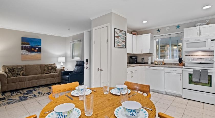Beachfront Family Condo Near Golfing and Shopping! photo