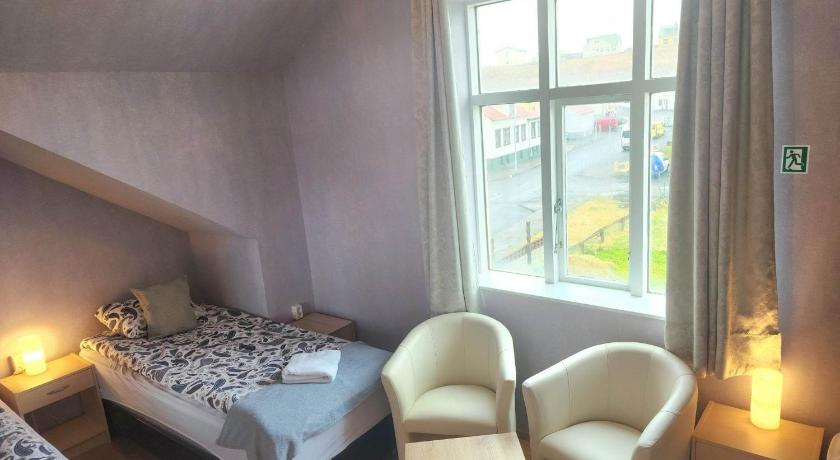 Image of Triple Room with Shared Bathroom 6