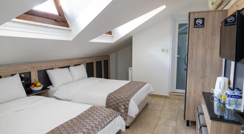Image of Economic Quadruple Room -  Attic 0