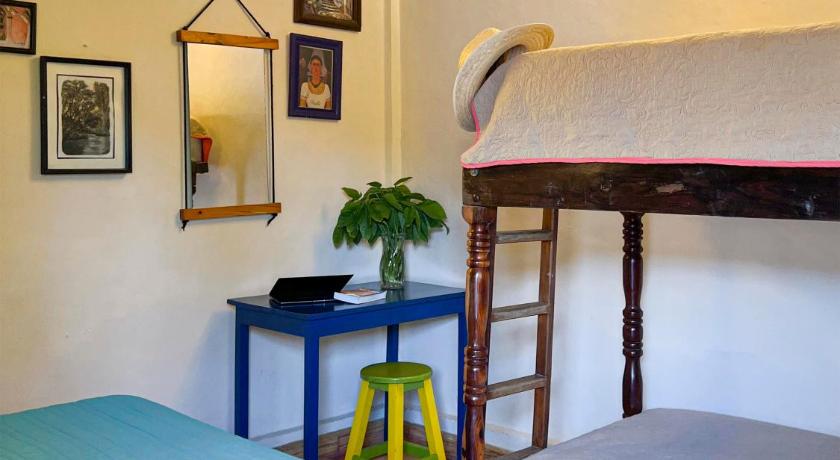 Image of Comfort Quadruple Room with Shared Bathroom 1