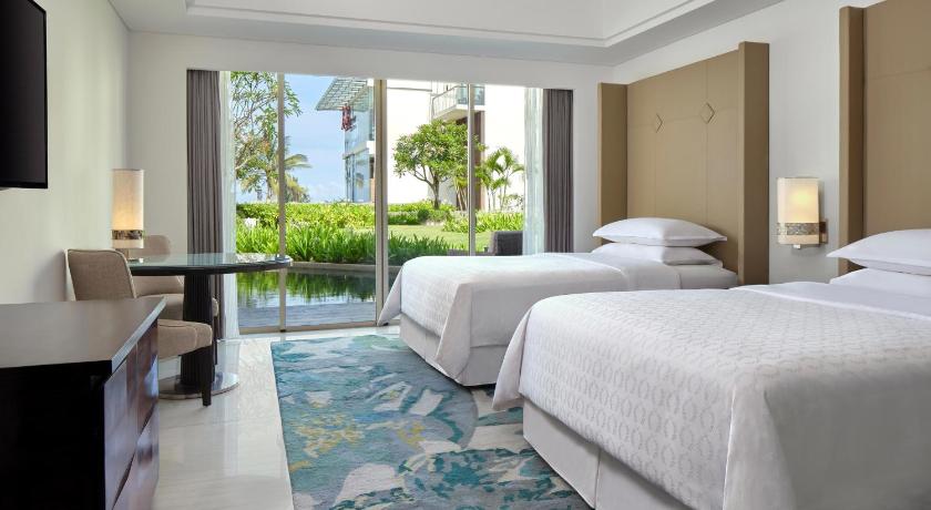 Image of Guest Room Garden View, 2 Double Beds (suitable for 2 adults & 2 children below 12 y.o. or 3 adults with Extra Bed) 1