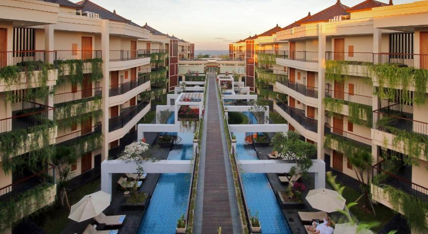 a large building with many windows and balconies, Vouk Hotel & Suites in Bali