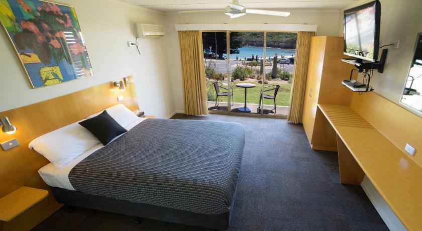 a hotel room with a bed and a television, Loch Ard Motor Inn in Great Ocean Road - Port Campbell