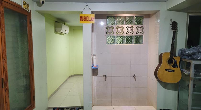 마카사르 OYO 90583 Balqies Homestay Syariah 2성급 호텔 레스토랑