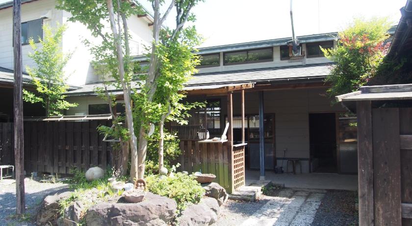 a large stone building with a tree in front of it, Furuki in Utsunomiya