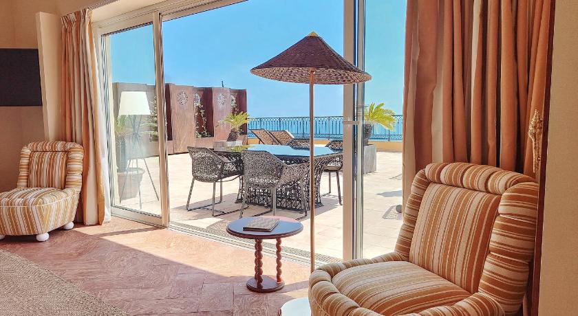 Immagine di Suite Mediterranée con Vista Mare (Suite Mediterranée with Sea View) 1