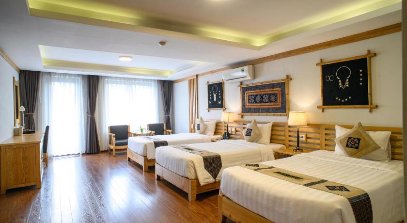 Image of Deluxe Triple Room 11