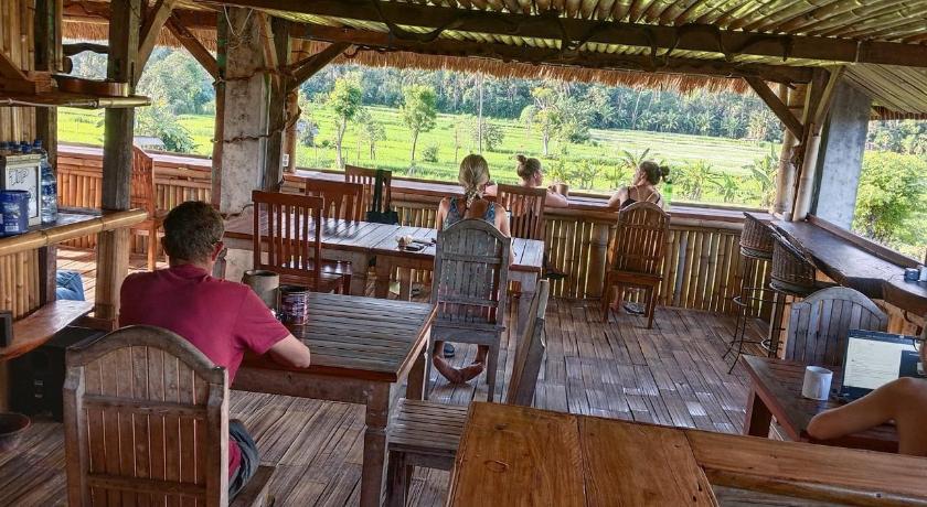 Amed Stop Inn Homestay, Rooftop Restaurant and Bar photo