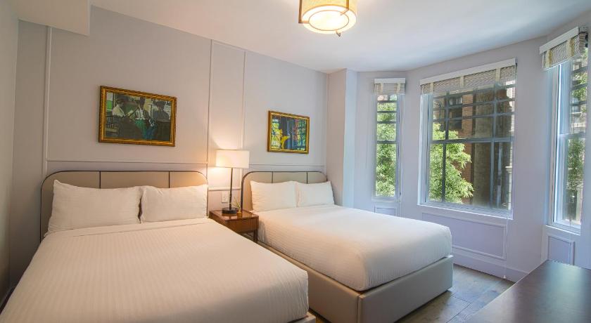 Фото: DELUXE 2 FULL BEDS 3