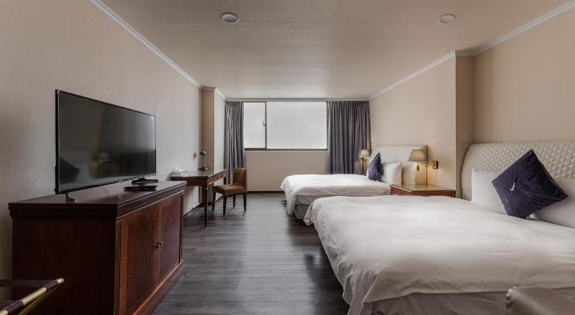 Image of Double Room with Two Double Beds 1