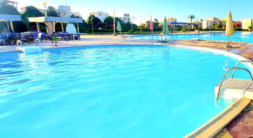 Stunning 5-Bedroom Villa with Breathtaking Sea Views & Roof Penthouse at Badr resort North Coast El  photo