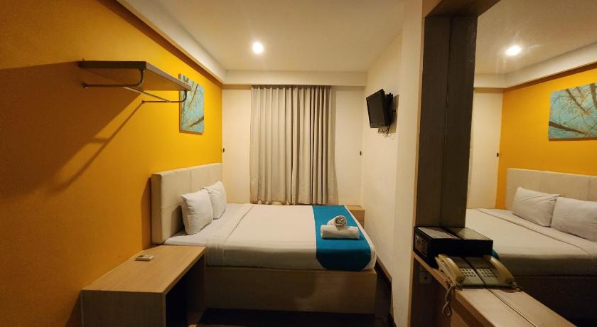 Foto Kamar Deluxe (Deluxe Room) 6