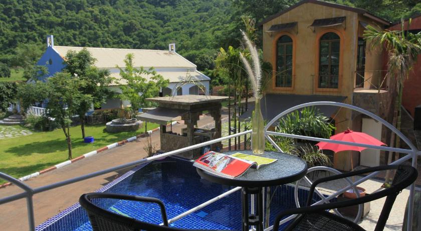 Image of Pool View Room with Two Double Beds 6