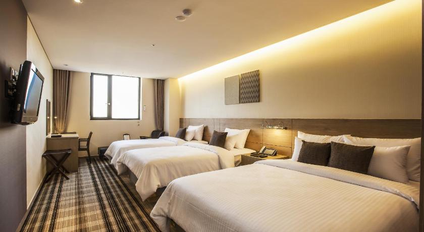 Bild av Trebäddsrum (Triple) 0