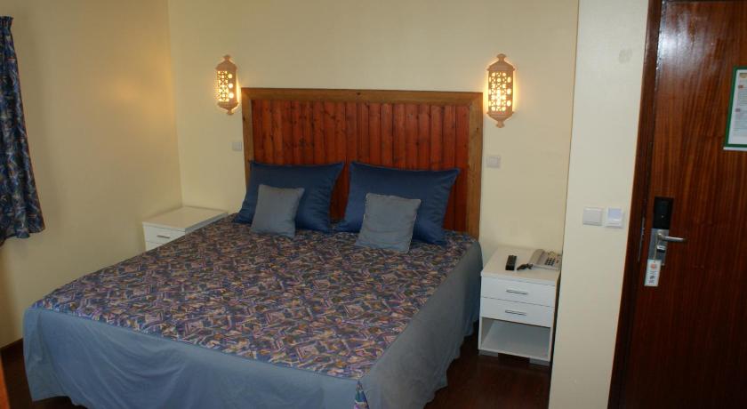 Image of Triple Room with Balcony with Back View 0