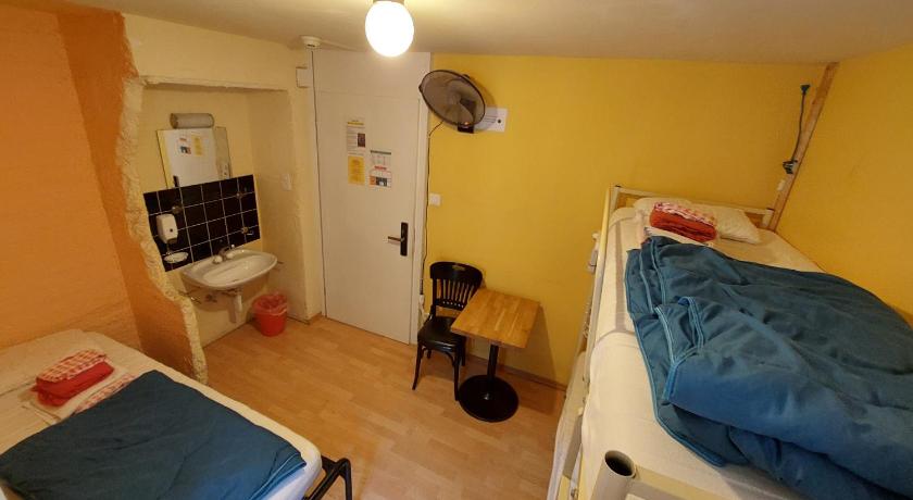 Image of Bed in Male Dormitory Room 1