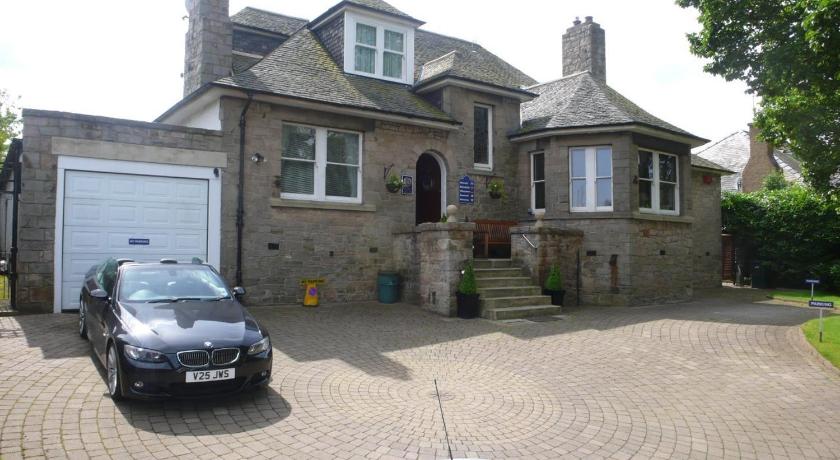 a car parked in front of a house, Sandilands House in Edinburgh