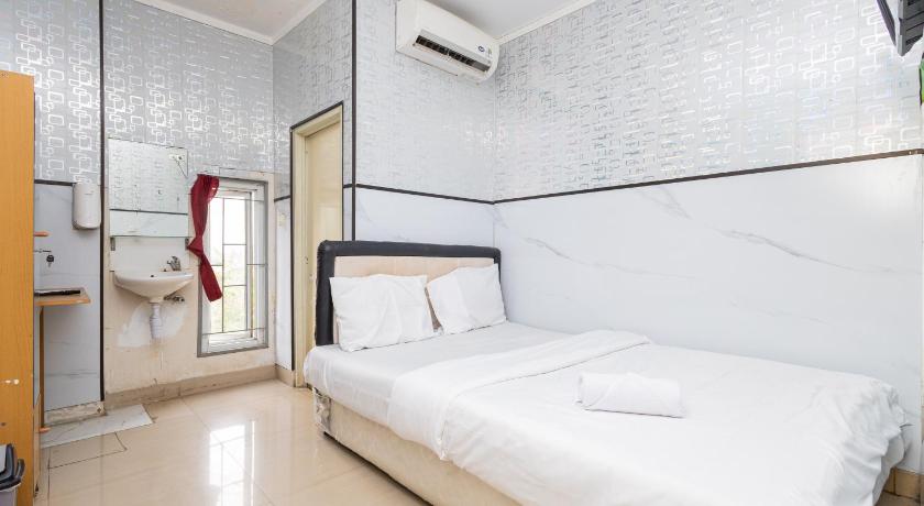 Alfa Guesthouse Serpong Mitra RedDoorz – Banten, PA