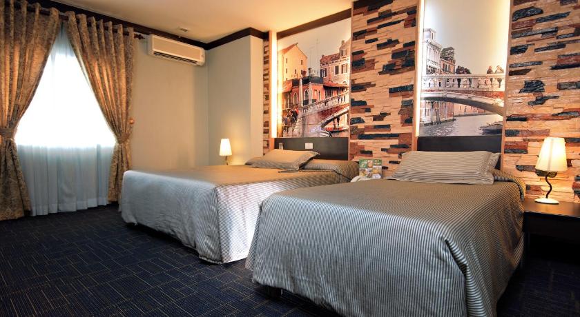 Bild von: Euro Suite 2 (1 Queensize- und ein Einzelbett) (Euro Suite 2 (1 Queen and 1 Single)) 0