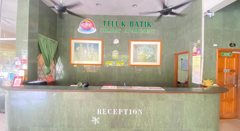 OYO HOME 90700 Teluk Batik Holiday Apartment photo