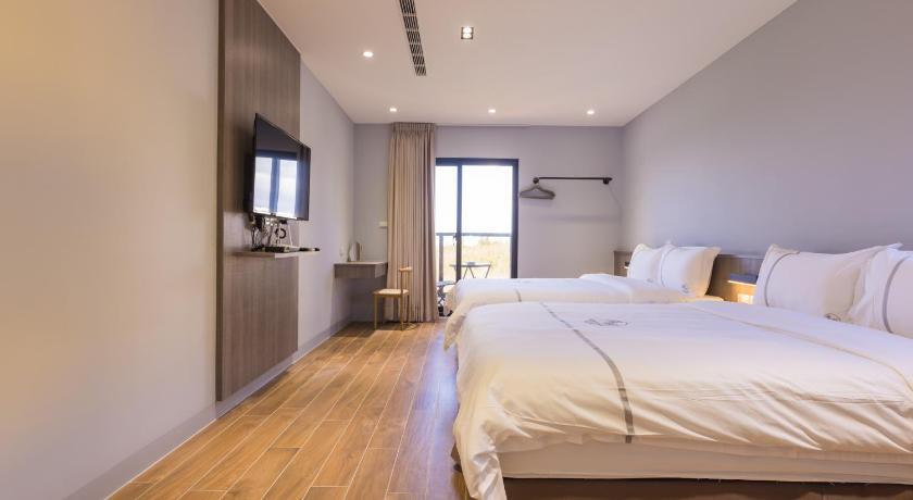 Image of Quadruple Room with Sea View 0