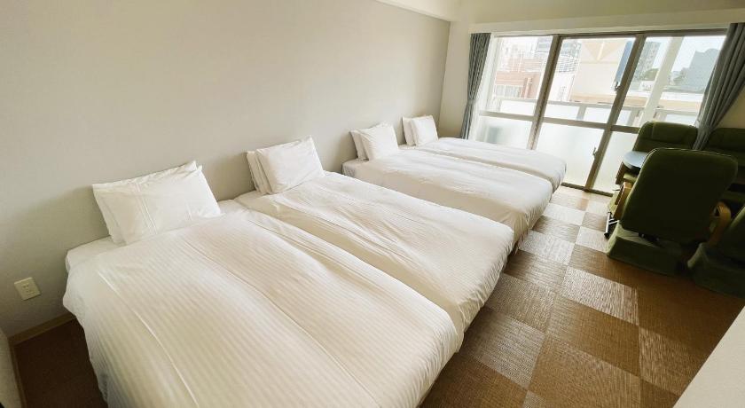 오키나와 본섬 호텔 코스모스 신토신 (Hotel Cosmos Shintoshin) 4성급 게스트하우스 객실