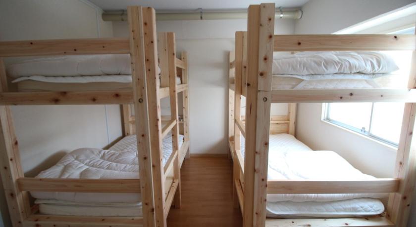 Image of Economy Quadruple Room with Shared Bathroom 1