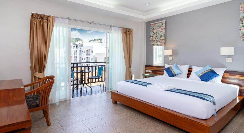 รูปของดีลักซ์ เตียงคิงไซส์ มีระเบียง (Deluxe Room with King Bed and Balcony) 6