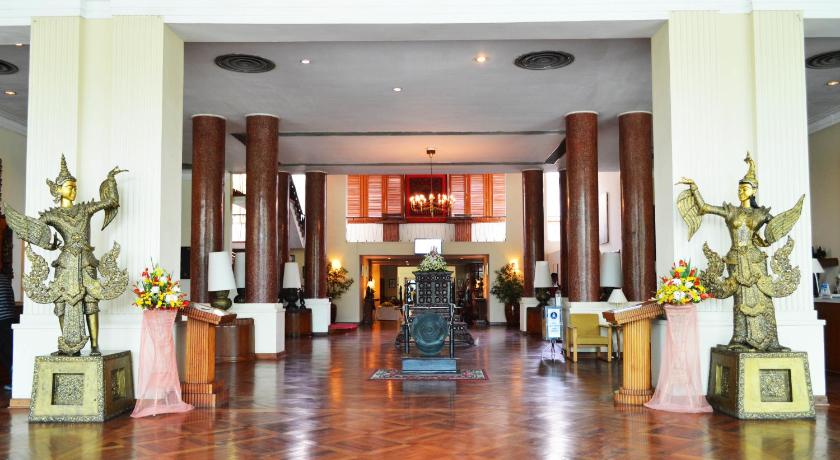 a living room filled with lots of furniture, Inya Lake Hotel in Yangon