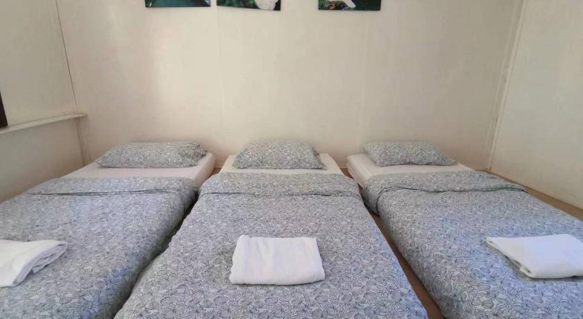 Image of Triple Room with Shared Bathroom 5