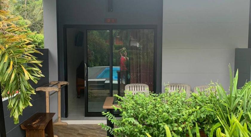 Image of Triple Room with Pool View 1