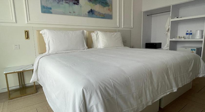 Фото: Номер Делюкс с кроватью размера «king-size» (Deluxe King Room) 5