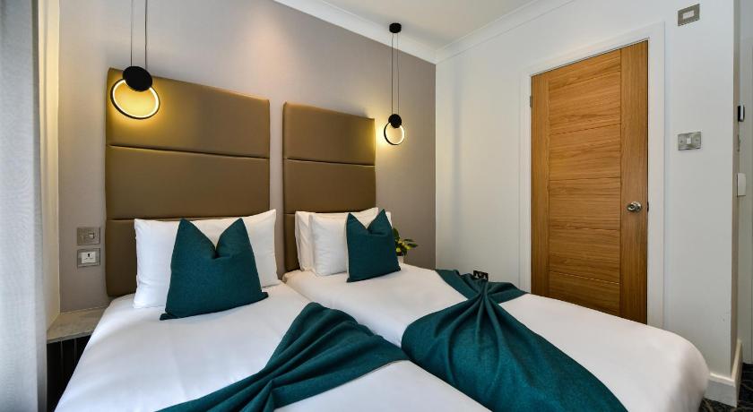 Image of Habitación Deluxe con 2 Camas (Deluxe Twin Room) 4