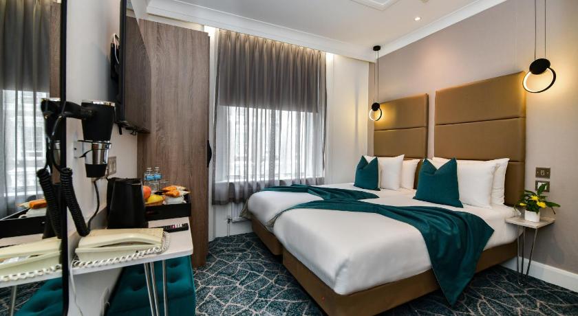 Image of Habitación Deluxe con 2 Camas (Deluxe Twin Room) 1