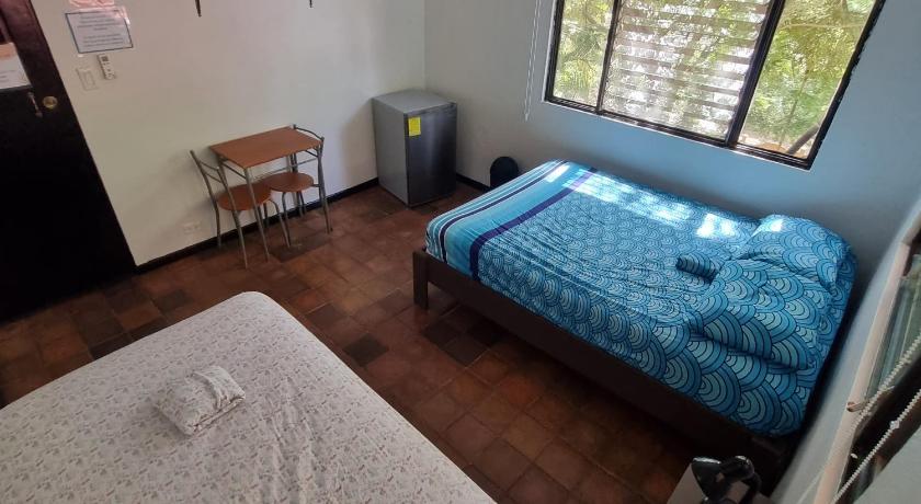 Image of Standard Triple Room with Shared Bathroom 5