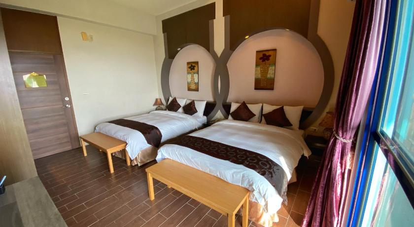 Image of Quadruple Room with Sea View 10