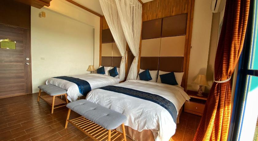 Image of Quadruple Room with Sea View 3