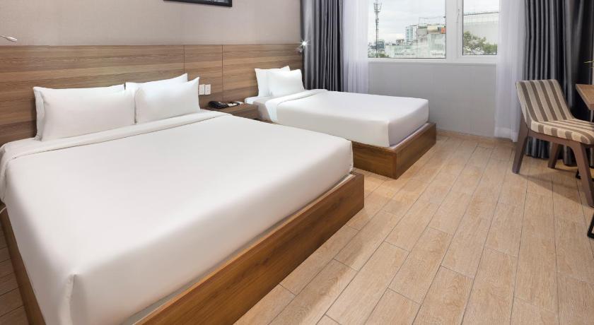 Image of Deluxe Triple Room 0