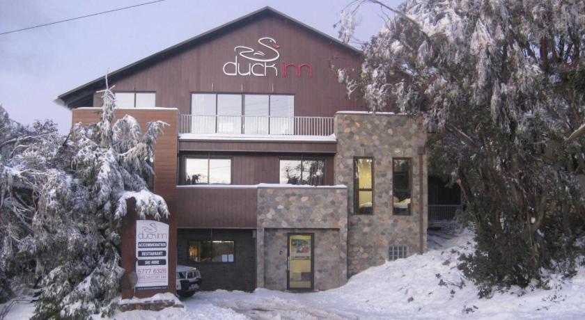 a large building with a snowboard on top of it, Duck Inn Mount Buller in Mount Buller