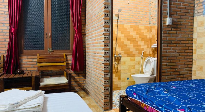 Image of Quadruple Room with Garden View 14