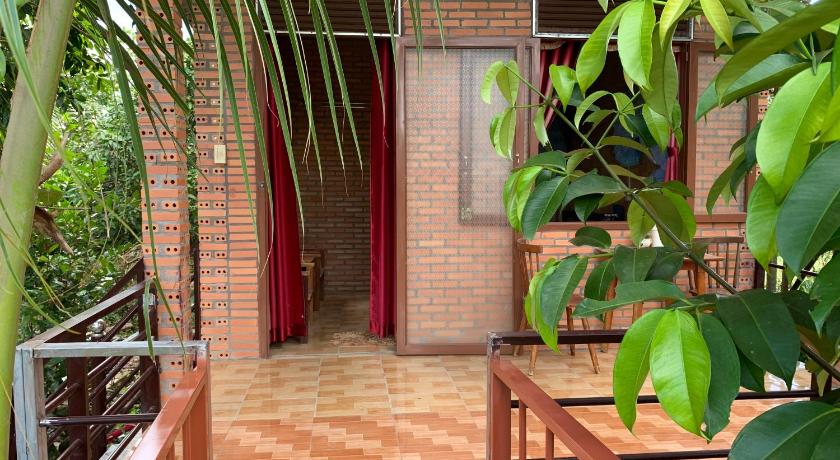 Image of Quadruple Room with Garden View 8
