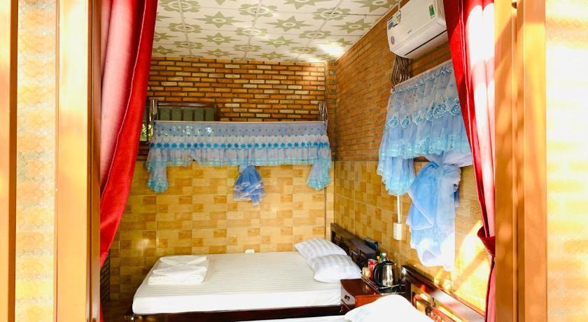 Image of Quadruple Room with Garden View 4