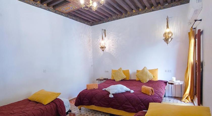 Image of Quadruple Room with Garden View 10