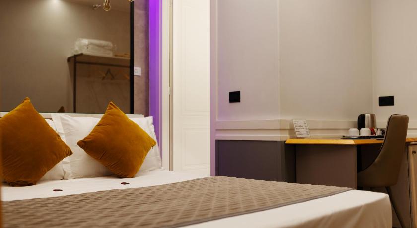 Deluxe szoba kétszemélyes vagy 2 külön ággyal - városra nyíló kilátással (Deluxe Double or Twin Room with City View) fotója 1