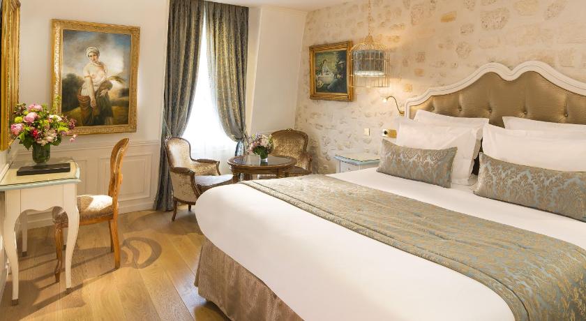 Immagine di Junior Suite con Vasca Idromassaggio (Junior Suite with Jacuzzi) 1