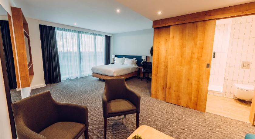 Image of KING PITCH VIEW ROOM W/ SOFA BED AND BALCONY 1