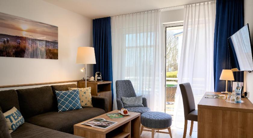 Image of Suite with Balcony and Side View of the Sea 1
