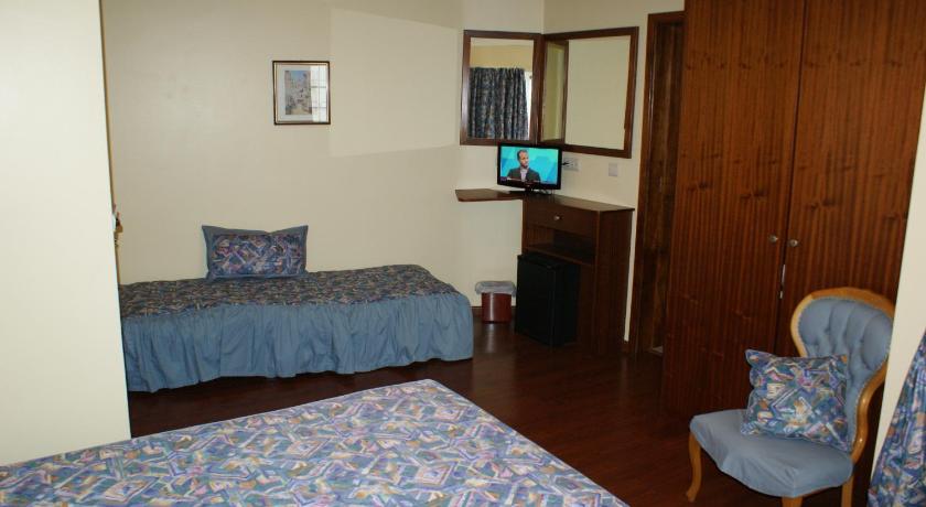 Image of Triple Room with Balcony with Back View 1
