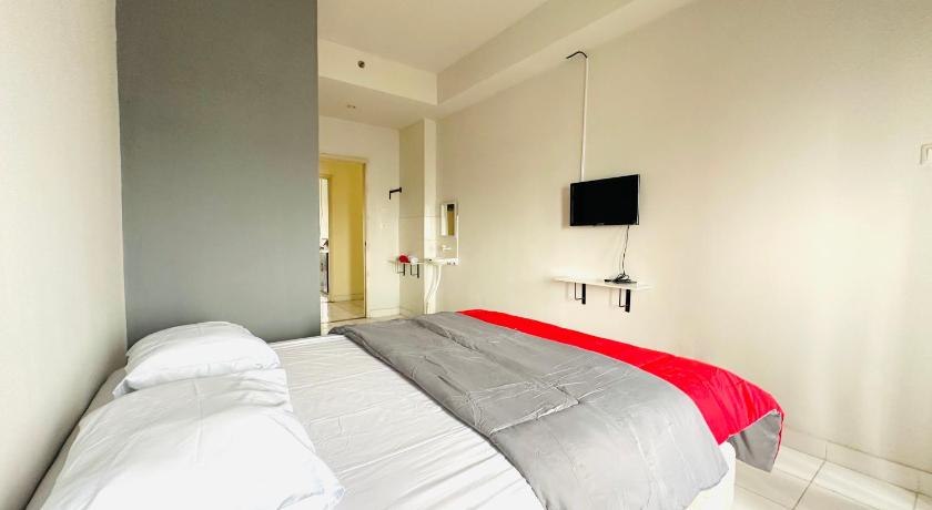 RedLiving Apartment @ Dramaga Tower by Liana Room - image 2
